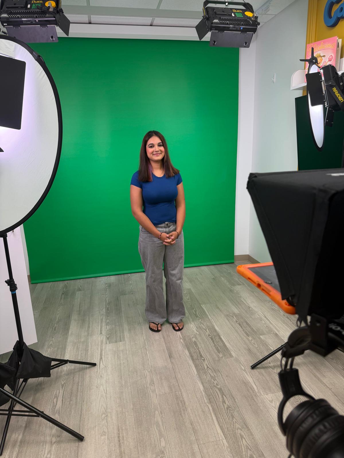 Myra on set in the studio during her TV interview